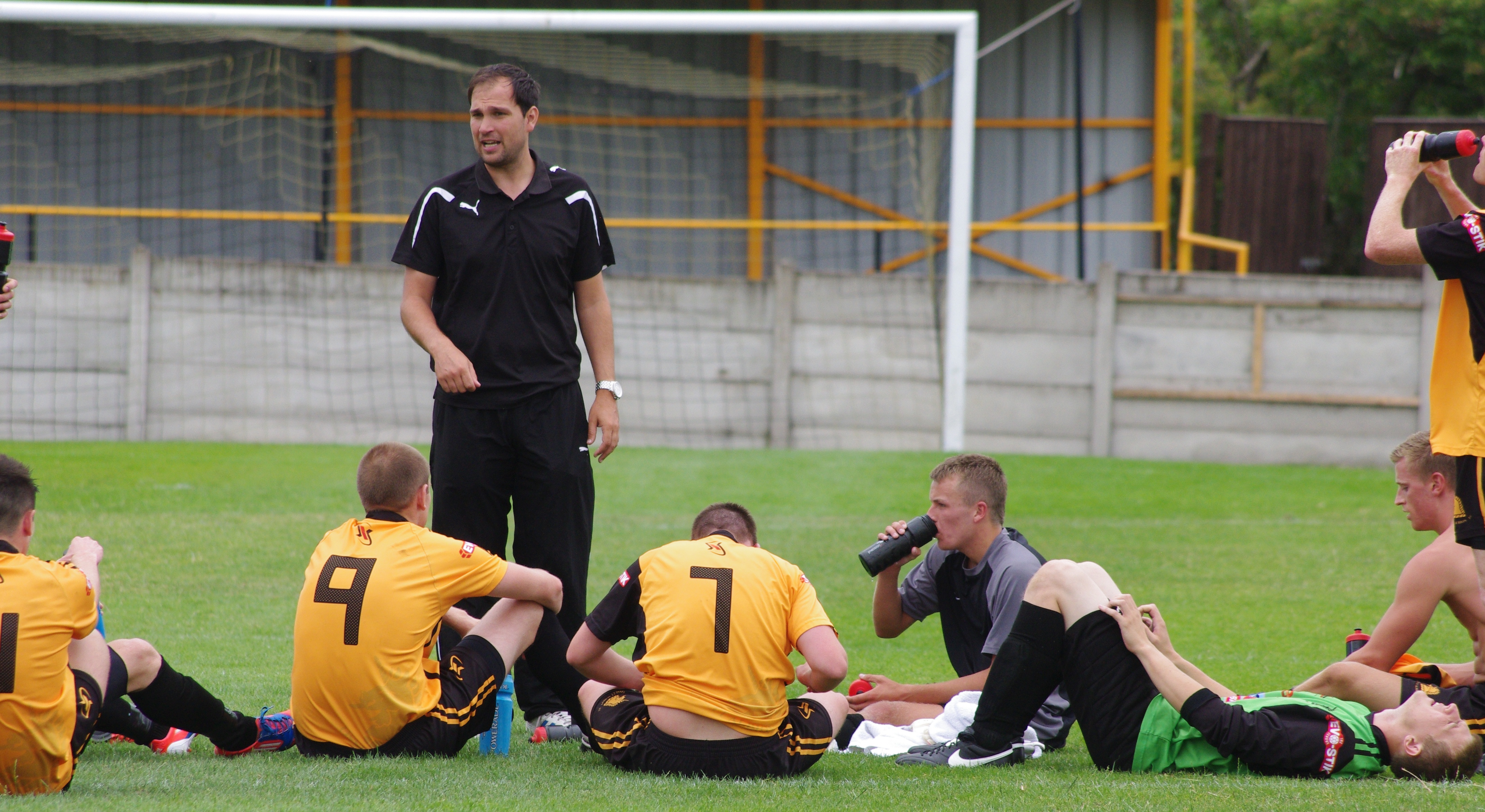 Richard Tracey speaks to his players