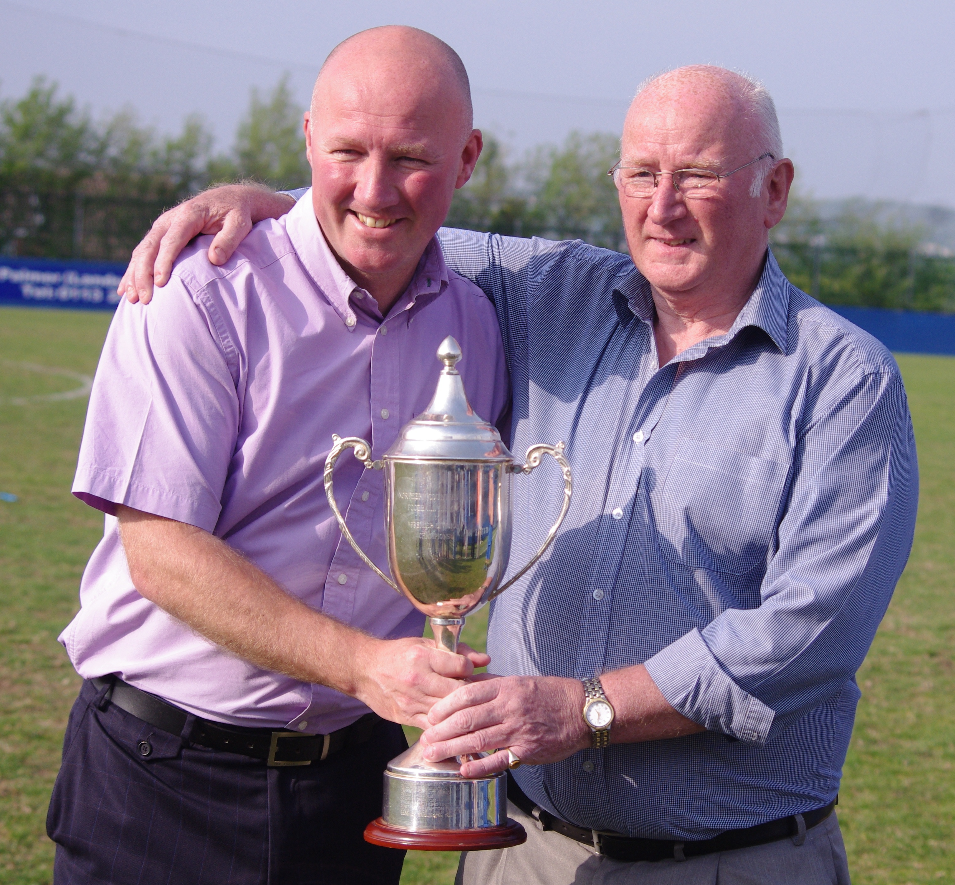 Parsley and his late father Charlie with the NCEL Premier Division trophy