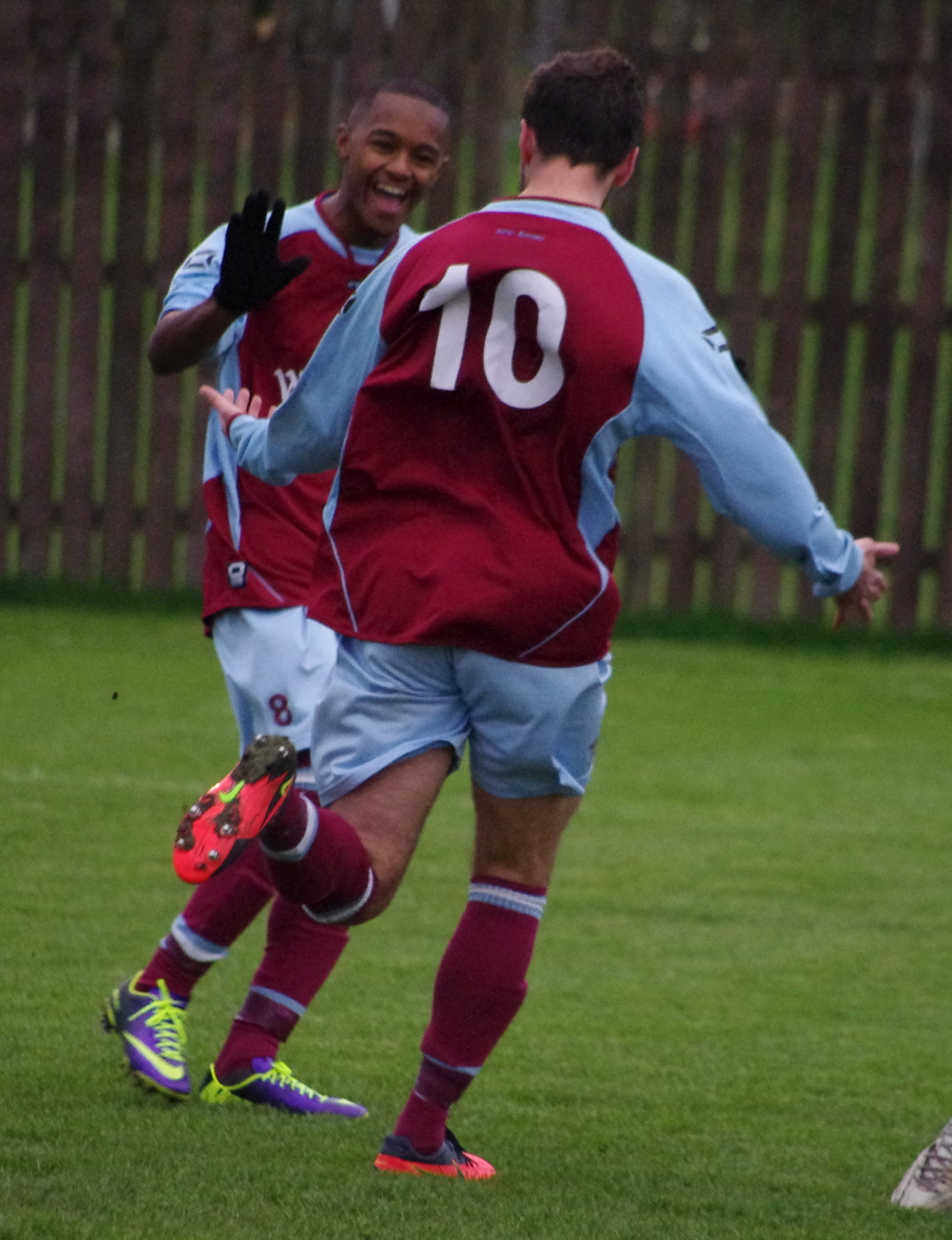 Alex Hallam runs to Doran Jordan after scoring