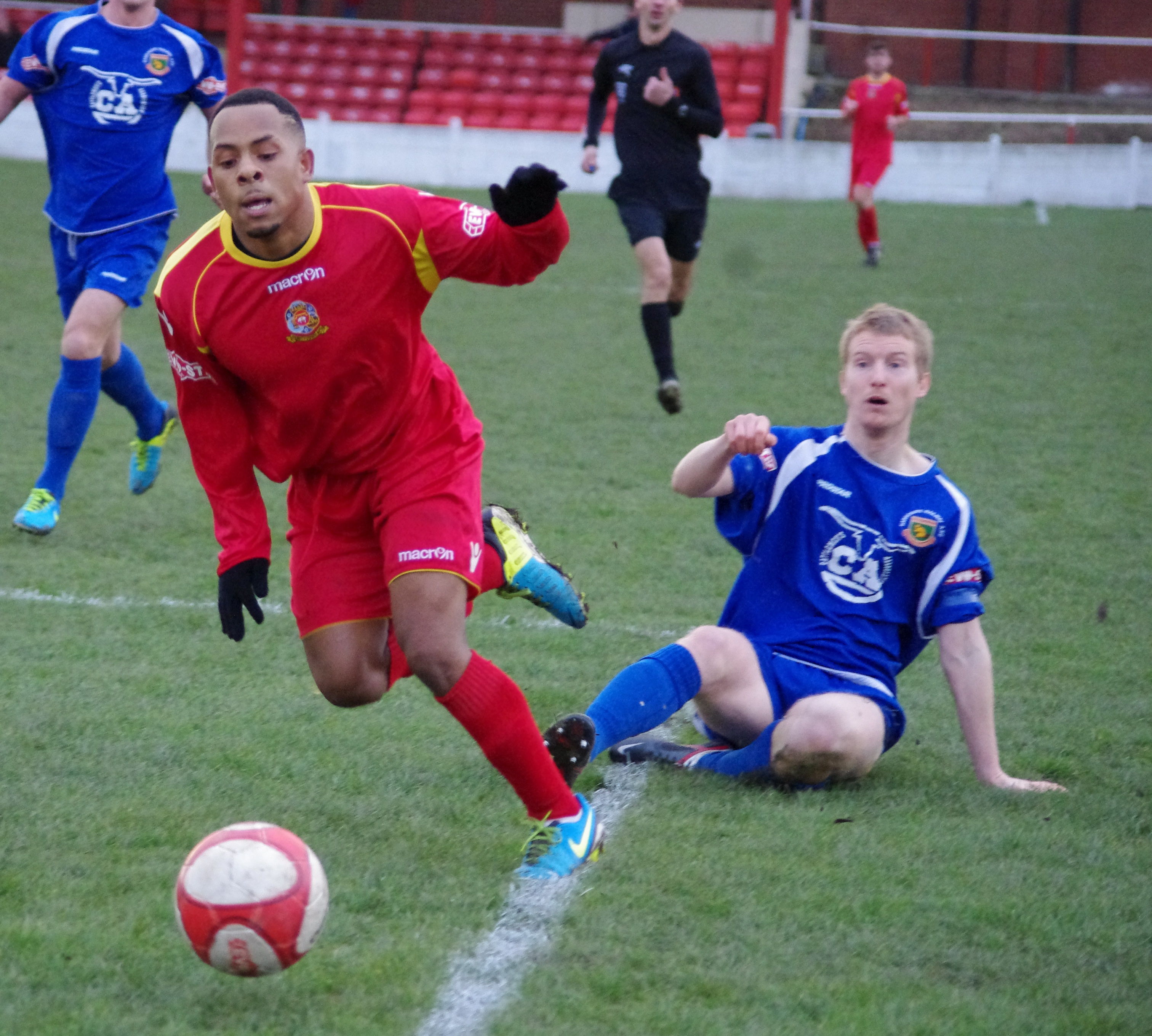 Ossett's Shaquille Clarke-Adams leaves Railway defender Simon Wood for dead