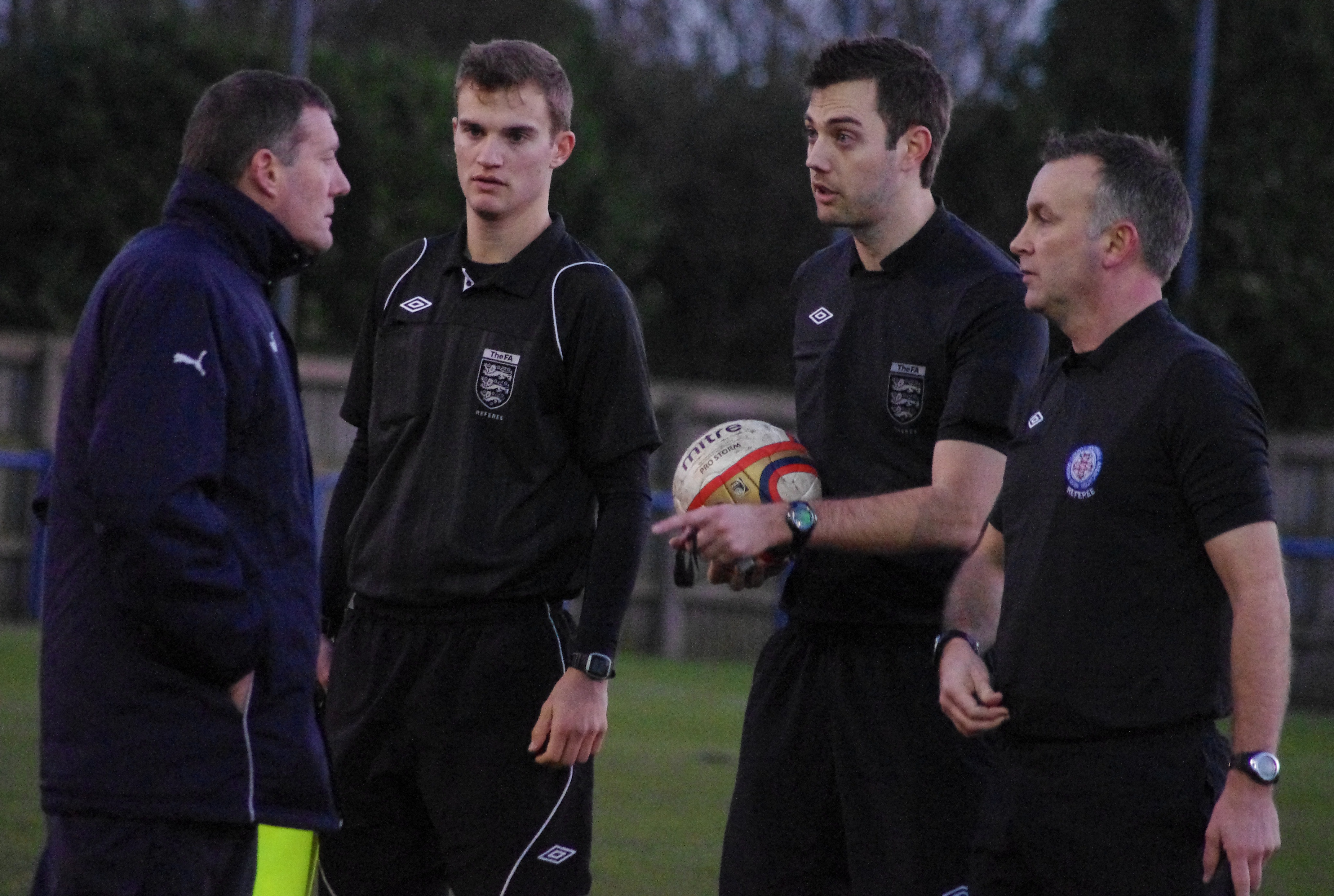 Pickering boss Mitch Cook gets his point across to referee Duncan Carratt at half-time