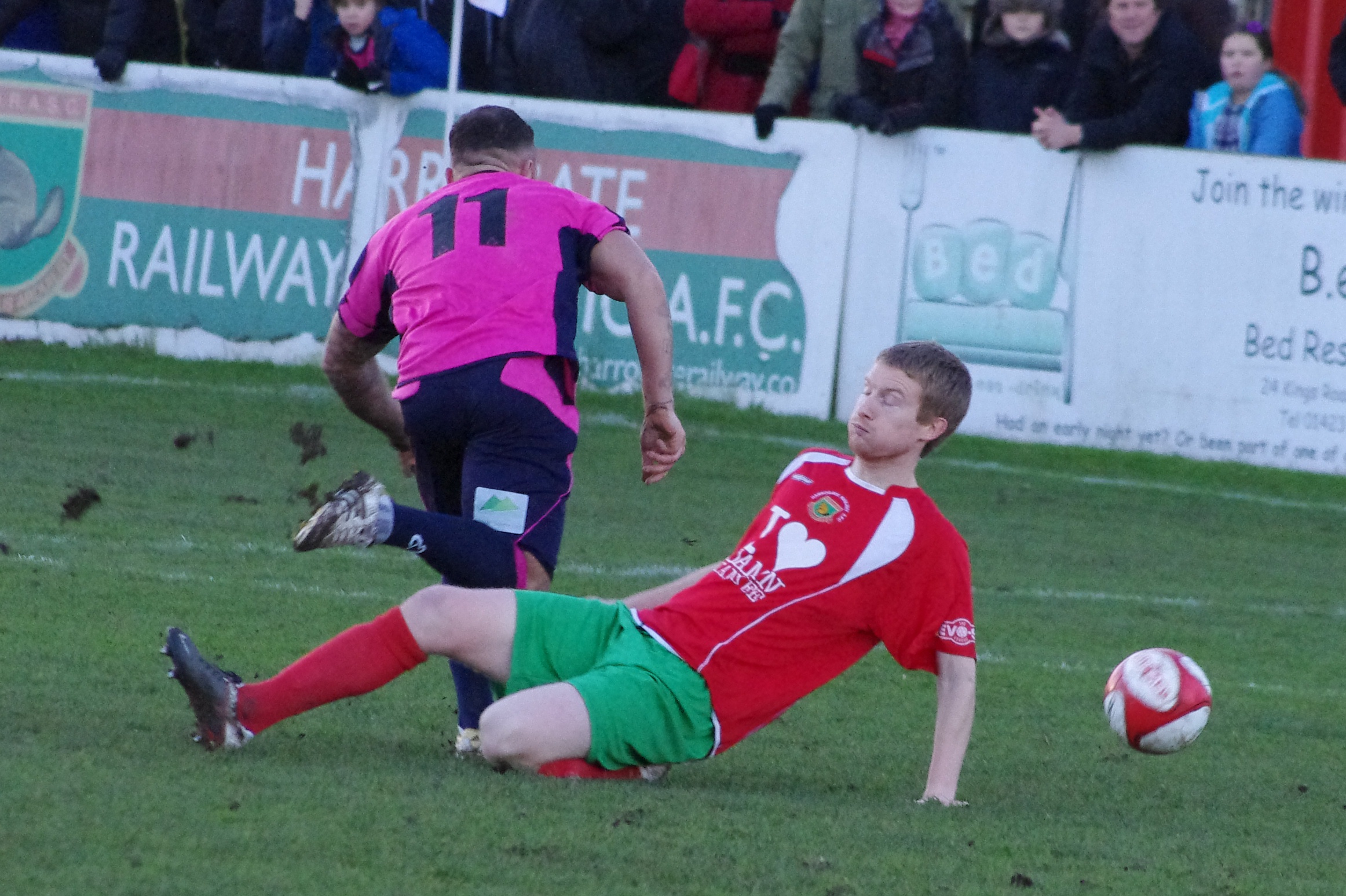 Goal-scorer Stephen Thompson gets the better of Harrogate defender Simon Wood