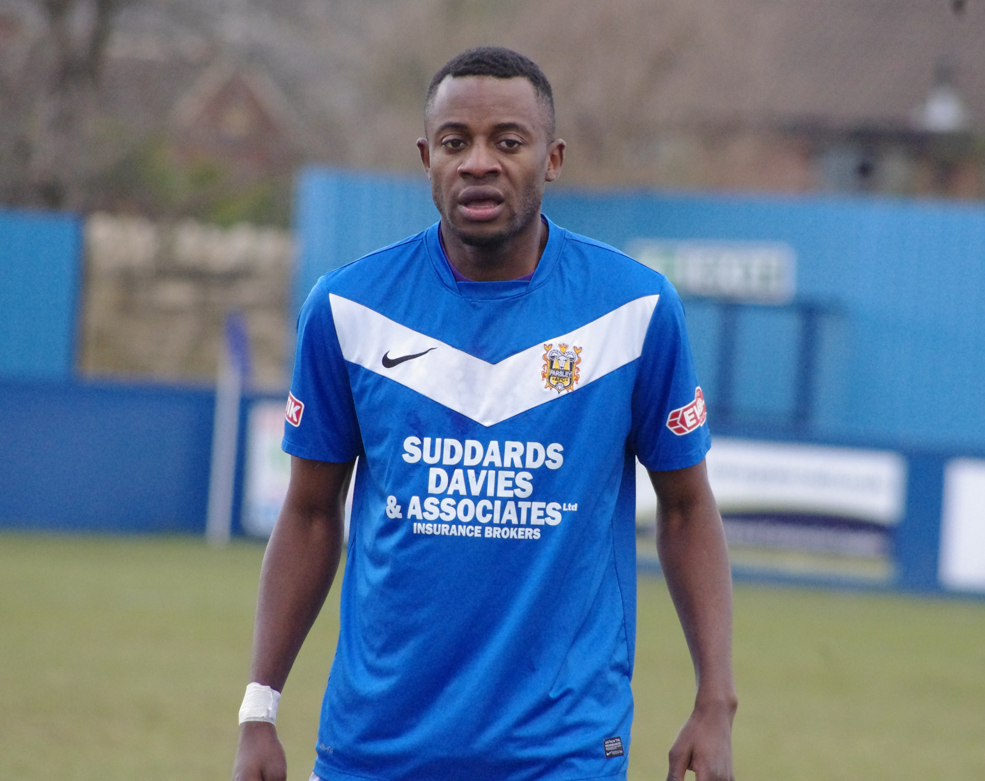 Former Farsley AFC midfielder Brice Tiani has signed for Ossett Town, along with Ryan Williams