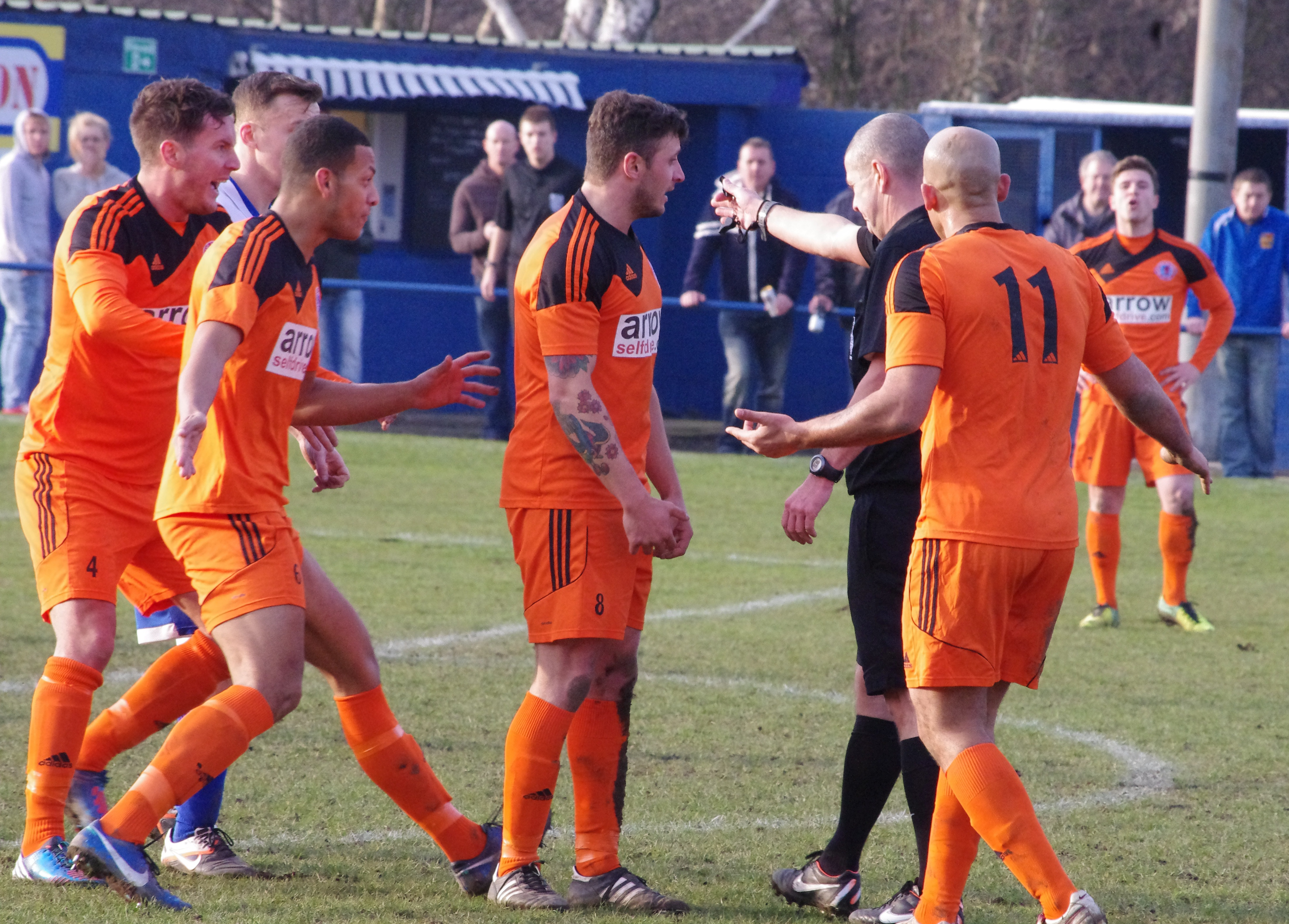 The Shaw Lane players were livid with the referee's decision to award Pontefract a penalty on 53 minutes