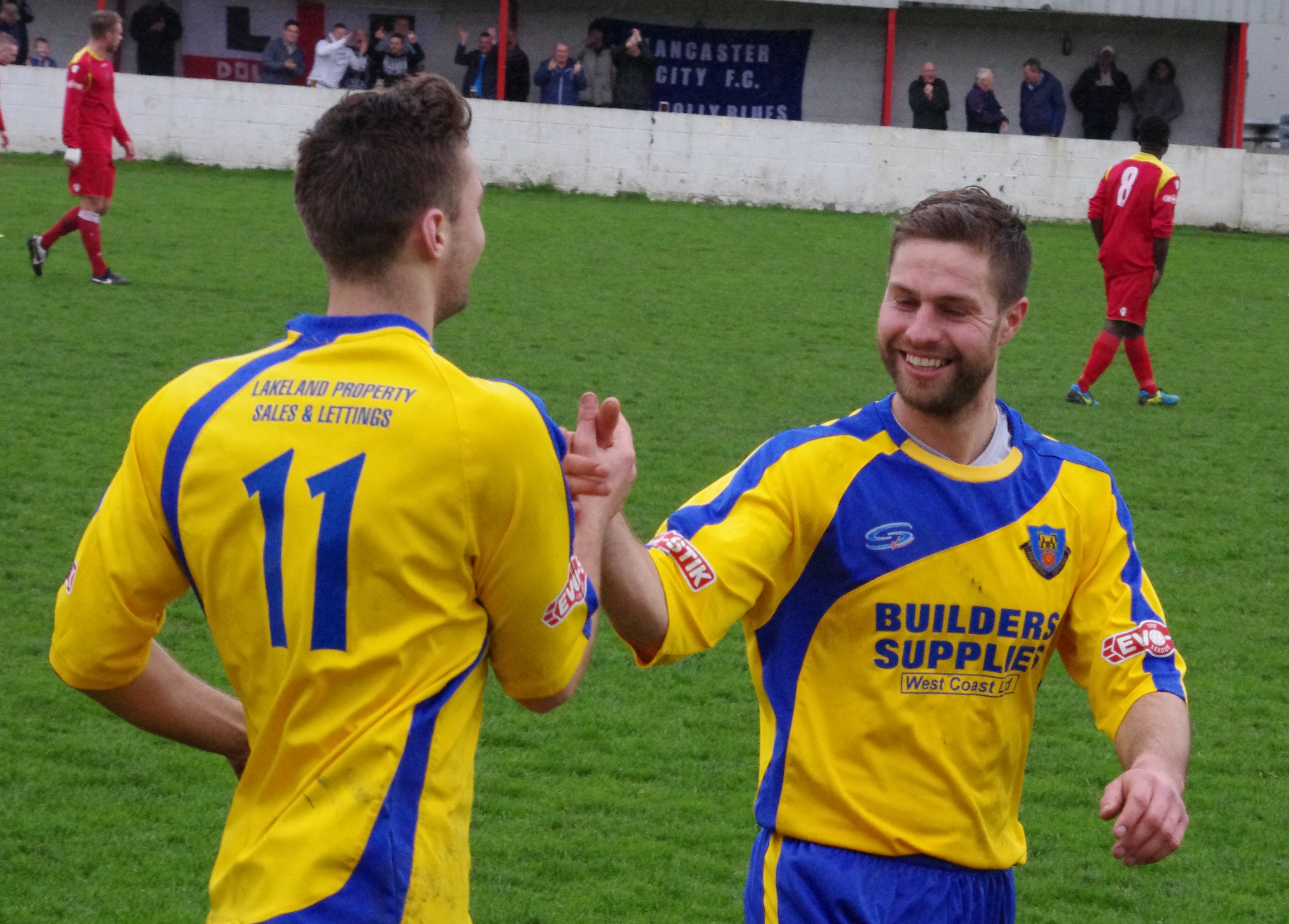 Tom Kilifin is congratuated after scoring his first goal in Lancaster City's 3-0 win at Ossett Town