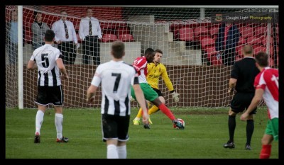 Malachi Farquharson scores to drag Harrogate Railway back into the game at 2-1. Photo: Caught Light Photography