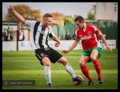 Adam Baker looks to create an attack for Harrogate. Photo: Caught Light Photography