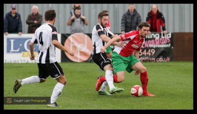 Rob Youhill striding forward for Harrogate Railway 