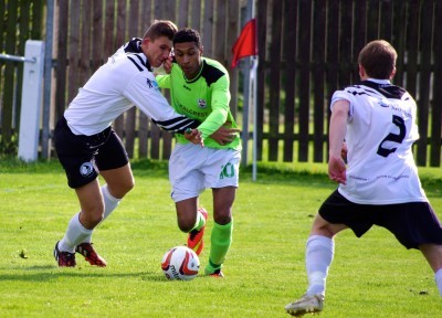 Antony Brown prepares to score the opening goal for AFC Emley