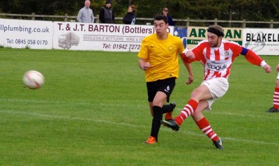 Andy Gillespie fires St Helens ahead in their 2-0 win over Nostell in the FA Vase