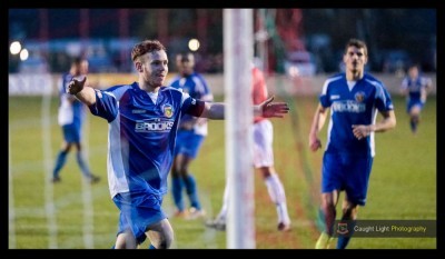 Nathan Cartman celebrates completing his hat-trick in Harrogate Railway's remarkable 4-1 victory at Salford City