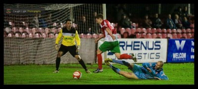 Harrogate Railway talisman Nathan Cartman  closes on in goal. Photo: Caught Light Photography