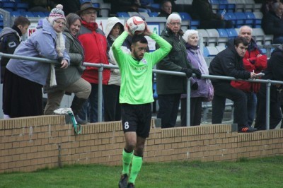 AFC Emley goal-scorer Kurtis Noble taking a throw-in during the 1-0 win at Hallam. Picture: Mark Parsons