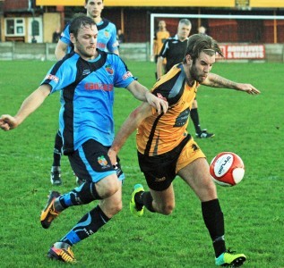 Ossett Albion goal-scorer Connor McDonagh battles in the 3-2 win over Kendal Town. Picture: John Hirst