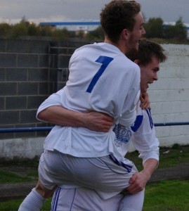 Nash Connolly jumps on Jack Steers after the second goal