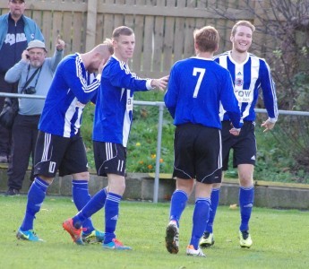 Shaw Lane players congratulate Lee Morris