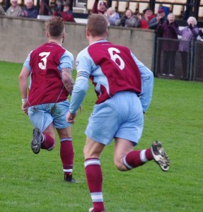 Mickey Starkey runs off after scoring for Emley