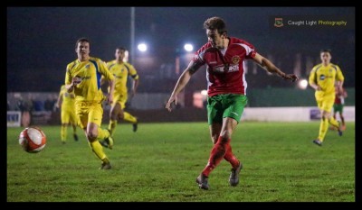 Adam Baker puts Harrogate Railway 2-0 in front against Frickley. Photo: Caught Light Photography