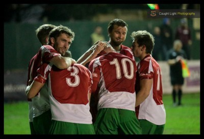 Togetherness: Harrogate Railway players are all pushing in the right direction. Photo: Caught Light Photography