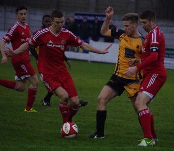 Albion's second goal-scorer Connor Bower battles for the ball