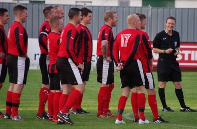 Referee Aaron Bannister loses the plot and cautions an entire teams