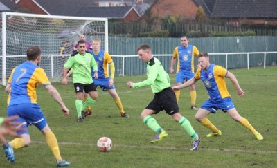 Steven Kenworthy looks to set up an attack for AFC Emley in the 2-2 draw at Bottesford. Picture: Mark Parson