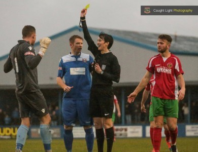 Tom Taylor being yellow carded for handling outside the area early on. Picture: Caught Light Photography