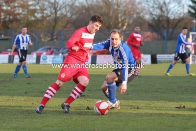 Luke O'Brien, who was sent, in action during Shaw Lane's 1-1 draw at Walsall Wood in the FA Vase