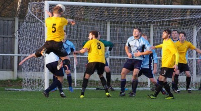 Henry Owen's header about to be saved by Ben Brunt