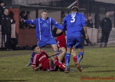 Ossett Town forward Nathan Curtis battling for the ball in the 2-0 defeat to Warrington. Picture: Mark Gledhill