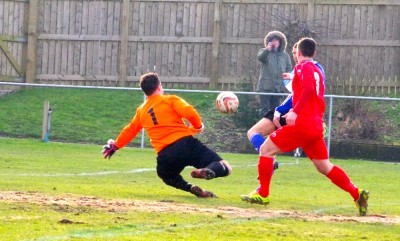 Man of the match Joe Thornton slips the ball across goal for Matt Thornhill