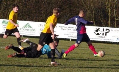 Lee Morris slots home Shaw Lane's second goal