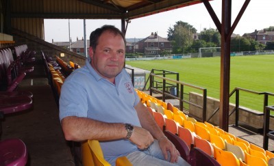 Terry Higgins has stepped down as chairman of AFC Emley because of work commitments 