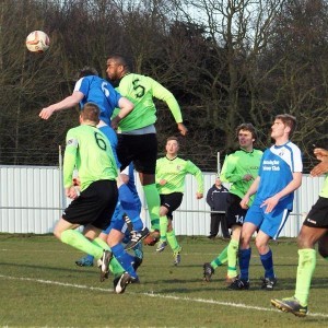 Sam Jerome heads AFC Emley level in their 4-2 defeat at Rossington. Picture: Mark Parson