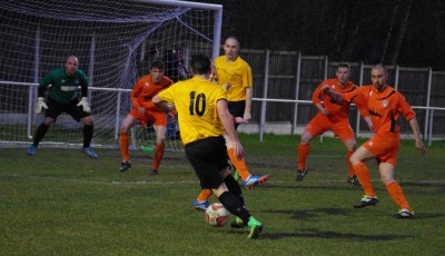 Bordman taking on several Retford defenders