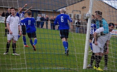 Morris celebrates as Saynor looks on