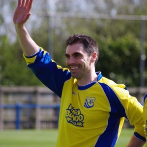 One of the players waves to the ground