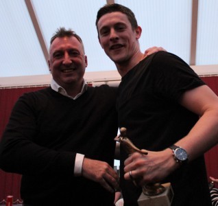 Darren Hepworth presents goalkeeper Adam Lawlor with one of his two awards. Picture: Mark Parsons