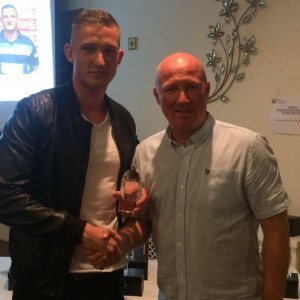 Tom Taylor receives the management player of the year award from Neil Parsley