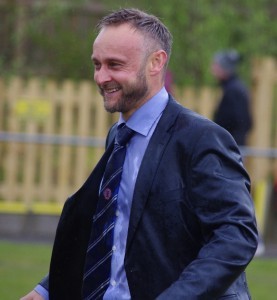 Craig Wood sees the funny side after being doused with champagne after the match