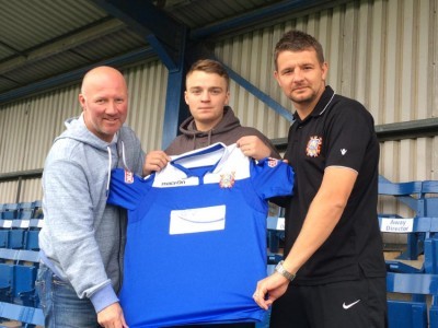 New Farsley Celtic midfielder Neil Stevens (centre) with Neil Parsley and assistant manager Mark Jackson (right)