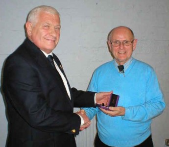 Barry Bennett, right, was presented with a long service award by the FA last year. West Riding County FA chairman Barry Chaplin presented the award to him.