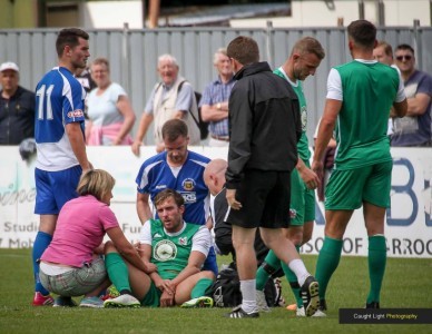 An injured Rob Youhill and his mother. Picture: Caught Light Photography