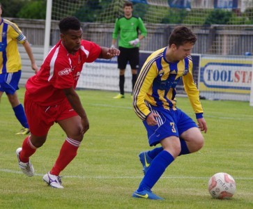 Danny Harris holds onto the ball for Garforth Town