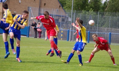 Stocksbridge captain Lee Garside heads wide during the second half