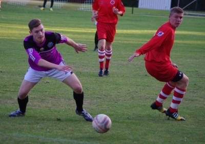 Garforth's Luke Mangham looks to sprint onto the ball