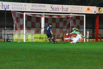 Jimmy Eyles fires Shaw Lane Aquaforce ahead in the 3-2 defeat at Lincoln. Picture: whiterosephotos.co.uk