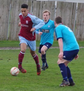 Ruben Jerome on the attack for AFC Emley