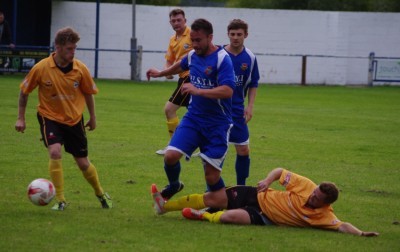 Pontefract's Mark Whitehouse is tackled during the 0-0 draw with Goole