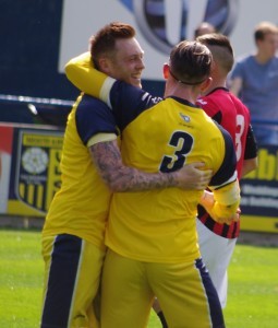 Liam Ormsby hugs Paddy Miller after putting Tadcaster ahead from the penalty spot